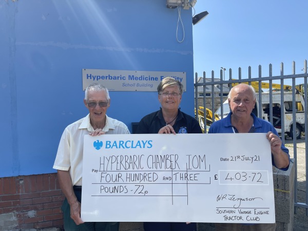 Presentation of Cheque - left to right: Orry Mitchell, Roy Ferguson and Debbie Barron